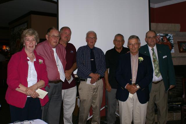 Honor Roll Members receiving gold trimmed &quot;Challenge Coins&quot; 5/18/2012 L-R Mary Kent-posthumously for her husband Harrison Kent, Jack Sweeny, Mike Boon-posthumously for his brother Robert Boon, Gene Goff, Don Fina for himself and posthumously for his brother Tom Fina, Chet Fobare, and John Wamsganz